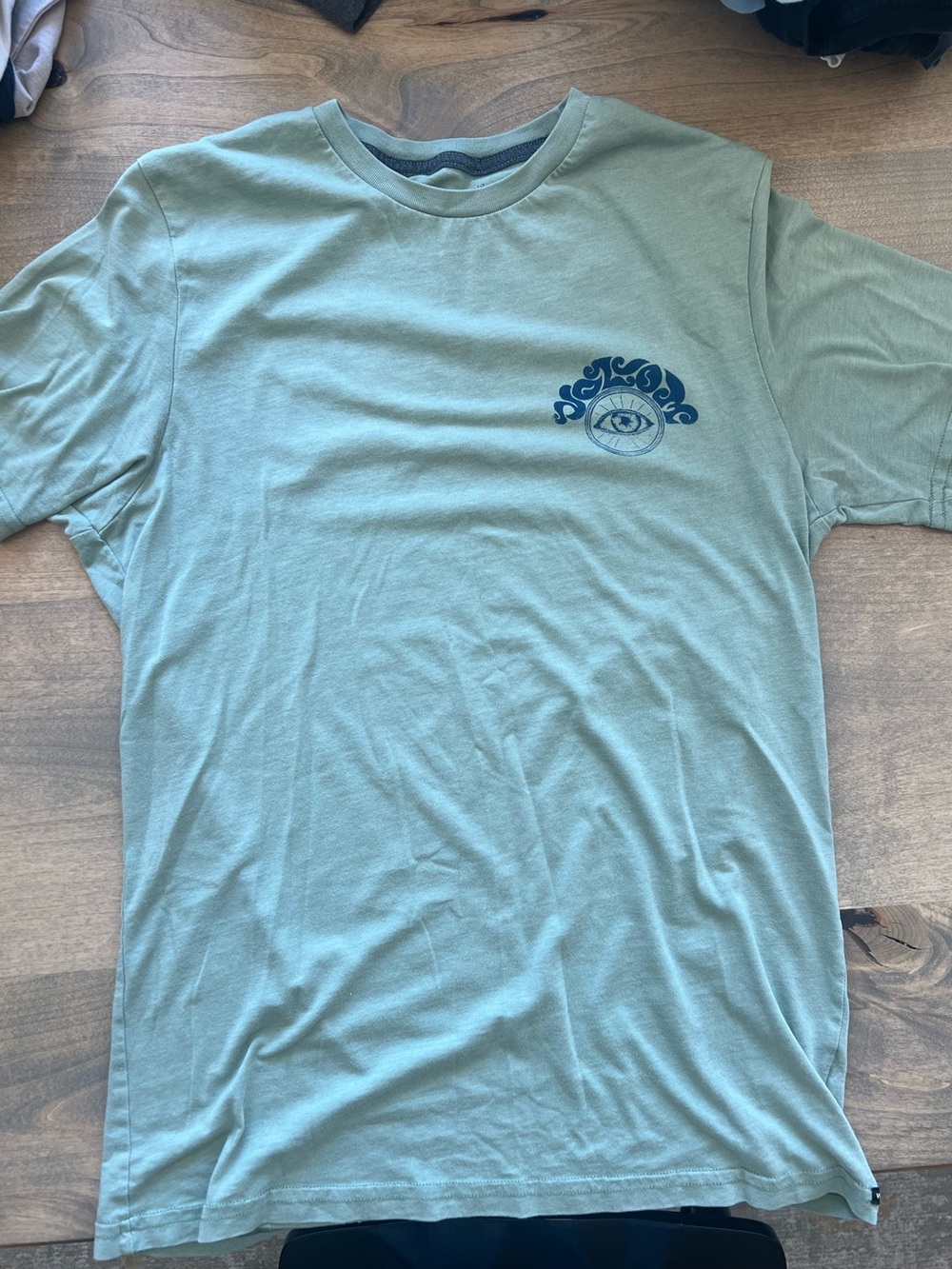 Volcom Sage Green Short Sleeve Tee with Navy Eye Graphic